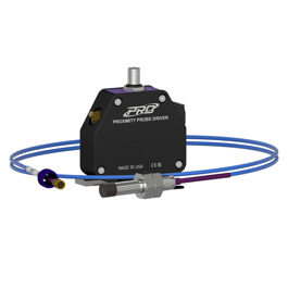 A black 11 mm proximity probe driver with purple faceplate surrounded by an 11 mm proximity probe on a blue extension cable.