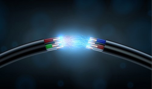 two black cables with exposed wires and electrical spark